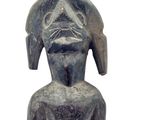 an image of a statue of a man with a hat on his head