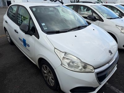 several white cars parked in a parking lot next to each other