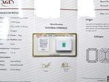 a picture of a certificate with a green diamond on it