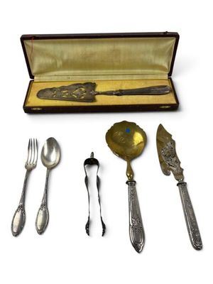 a silverware set in a case with a spoon and fork