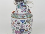 an image of a vase with a lid on a white surface