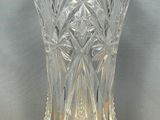 a glass vase that is sitting on a table