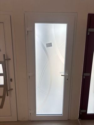a picture of a door with frosted glass on it
