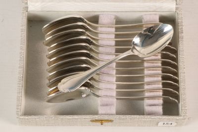 several spoons and spoon spoons in a white box with a pink and white checkered cloth