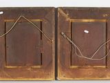 pair of antique wooden picture frames with wire hanging from them