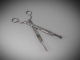 a pair of scissors sitting on top of a table