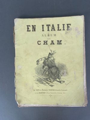 un vieux livre avec l'image d'un homme sur un cheval
