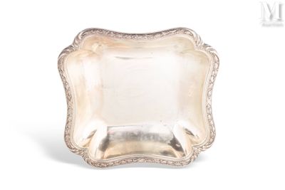 an antique silver plate on a white background with a white background