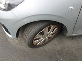 a car that has a flat tire on the street