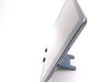 a close up of a cell phone on a stand