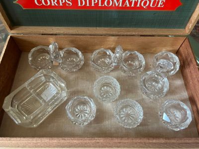 a box with a lot of glass items inside of it