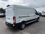 2020 ford transit - cargo van in a parking lot