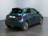 an image of a small car parked in a showroom