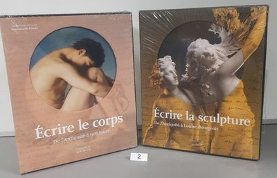 two books on a table with a picture of a man and a woman
