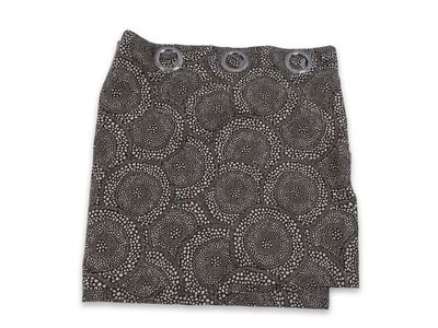 black and white patterned skirt with buttons on a white background