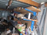 a garage with a lot of boxes and boxes on the shelves