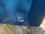 a close up of a piece of luggage on the ground