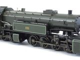 a toy train that is sitting on a white surface