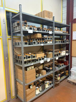 many boxes and boxes on the shelves in the warehouse