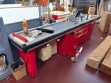 an image of a workbench in a factory with a lot of tools
