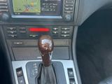 a car dashboard with a gear stick in the center of it