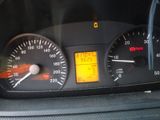 a close up of a car dashboard with a speedometer