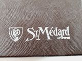 a close up of a wallet with a logo on it
