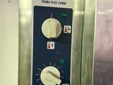 a close up of a control panel in a kitchen