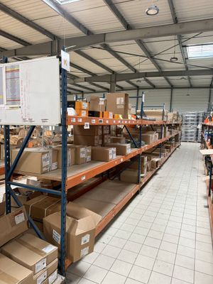 a large warehouse filled with lots of boxes and boxes
