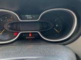 a close up of a car dashboard with a speedometer and gauges