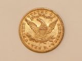 an image of a gold coin with an eagle on it