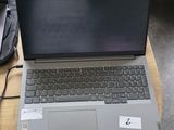 two laptops that are sitting on a table