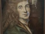 portrait of a man with long red hair and a green coat
