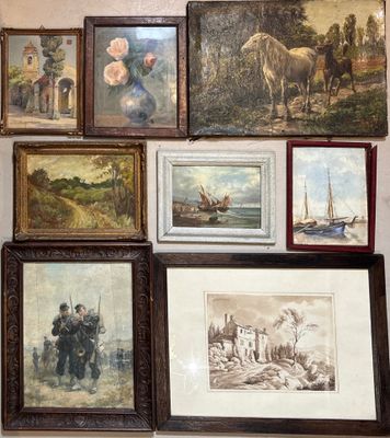 many framed pictures on the wall of this room