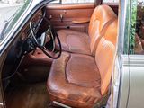 a brown leather seat in the back of a car