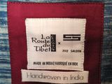 a close up of the label on the back of a jacket