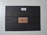 a picture of a black box with a stamp on it