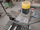a machine that is sitting on a table in a warehouse