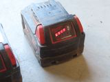 two batteries that are sitting on the floor