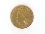 an image of a gold coin with a headdress on it