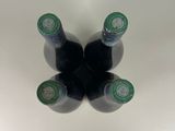 three bottles of beer that are sitting on a table