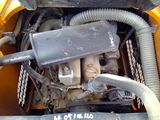 a close up of the engine of a small vehicle