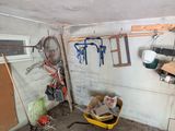 an image of a room with a lot of clutter and tools