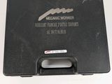 an image of a black briefcase sitting on top of a white table