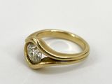 an image of a gold ring with a diamond on it