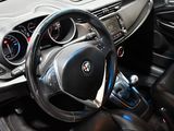a picture of a car dashboard with a steering wheel