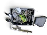 an overhead view of a tool box filled with fishing gear