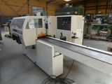 an image of a machine that is working on a piece of metal