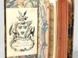 a book with a picture of a coat of arms on it