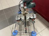 a machine that is sitting on the floor with tools on it